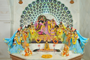 Inside view of the sanctum sanctorum Krishna and Radharani in the centre flanked by four sakhis on either side. Krishna is depicted in swaying motion, Playing his flute. Each of the Ashta Sakhis